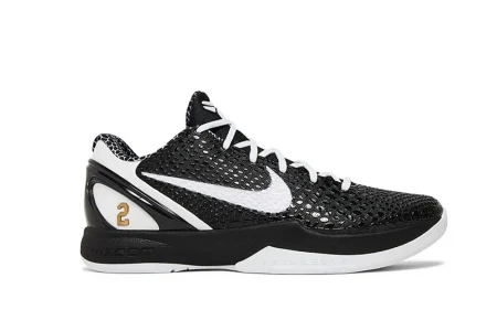 A front view of the outer side of the right shoe of the Kobe 6 Protro ‘Mambacita Sweet Sixteen,’ showcasing its predominantly black PU material and overall silhouette.