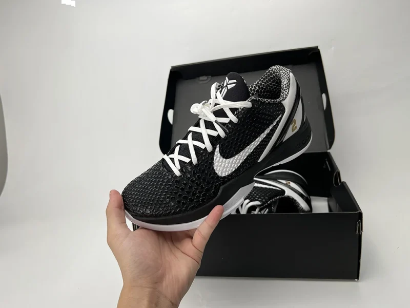 A top-down view of the outer side of the left shoe of the Kobe 6 Protro ‘Mambacita Sweet Sixteen,’ showcasing the signature PU upper material and the black shoebox