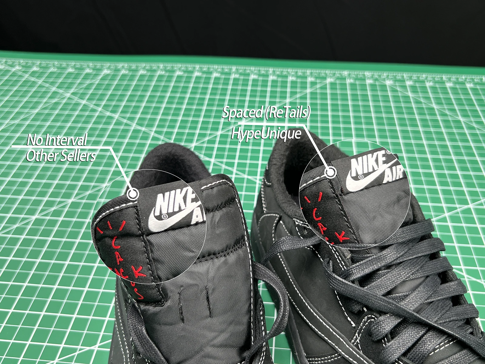 a pair of black sneakers on a green surface