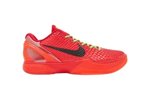 A front view of the outer side of the right shoe of the Zoom Kobe 6 Protro ‘Reverse Grinch,’ showcasing its predominantly red PU material and overall silhouette