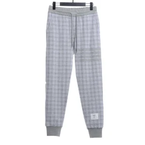 Checked jacquard trousers