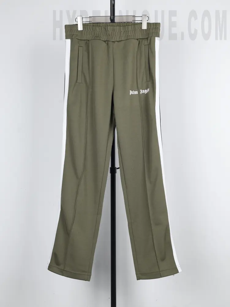 a green pants with white stripes