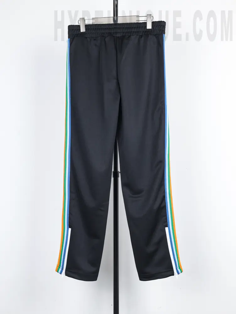 a black pants with red stripes