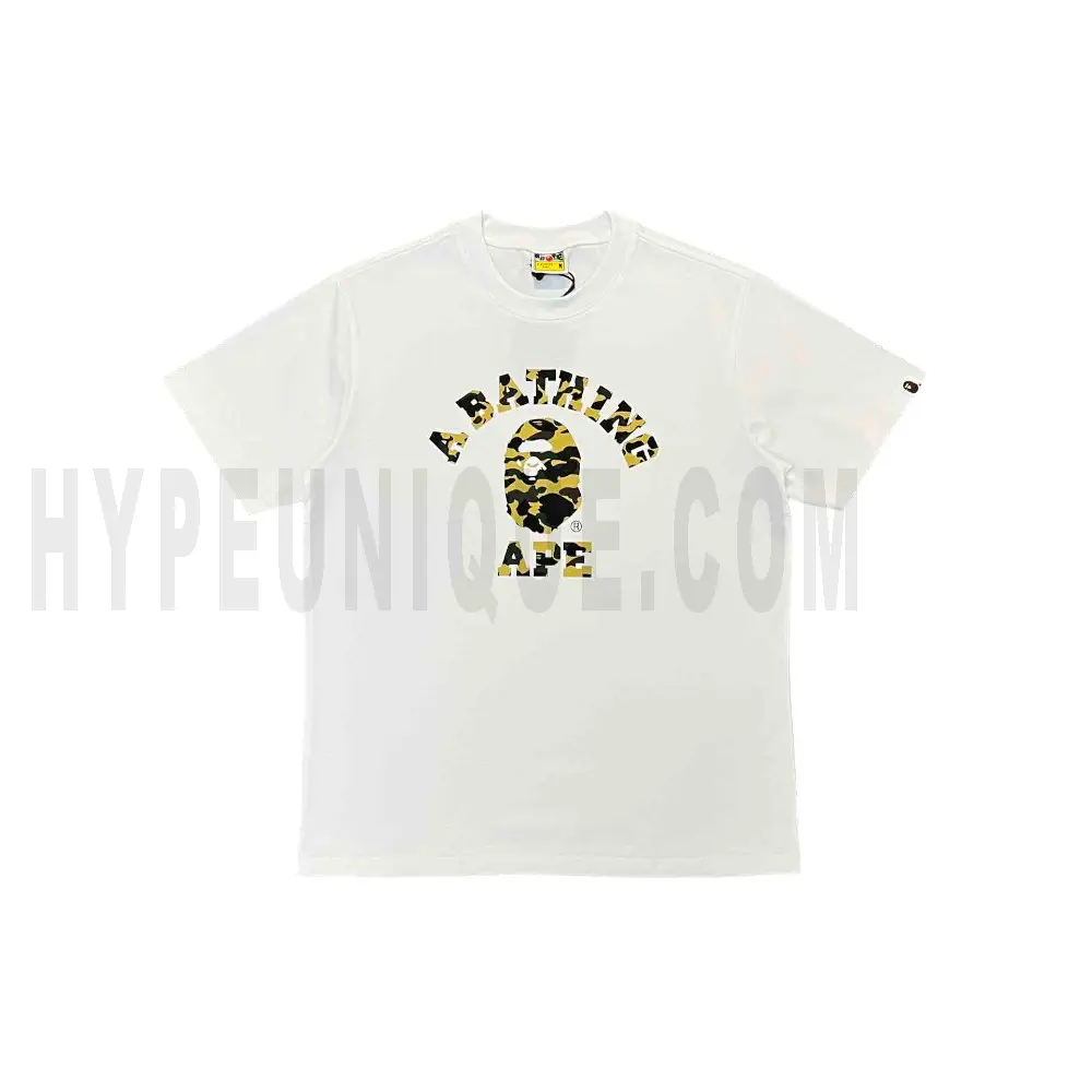 The white shirt with a yellow graphic