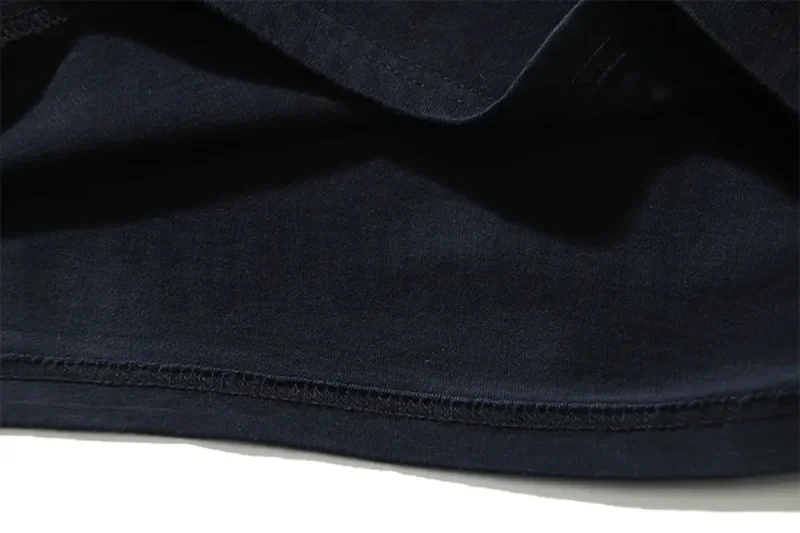 Precision cutting and sewing techniques in shirt tail.