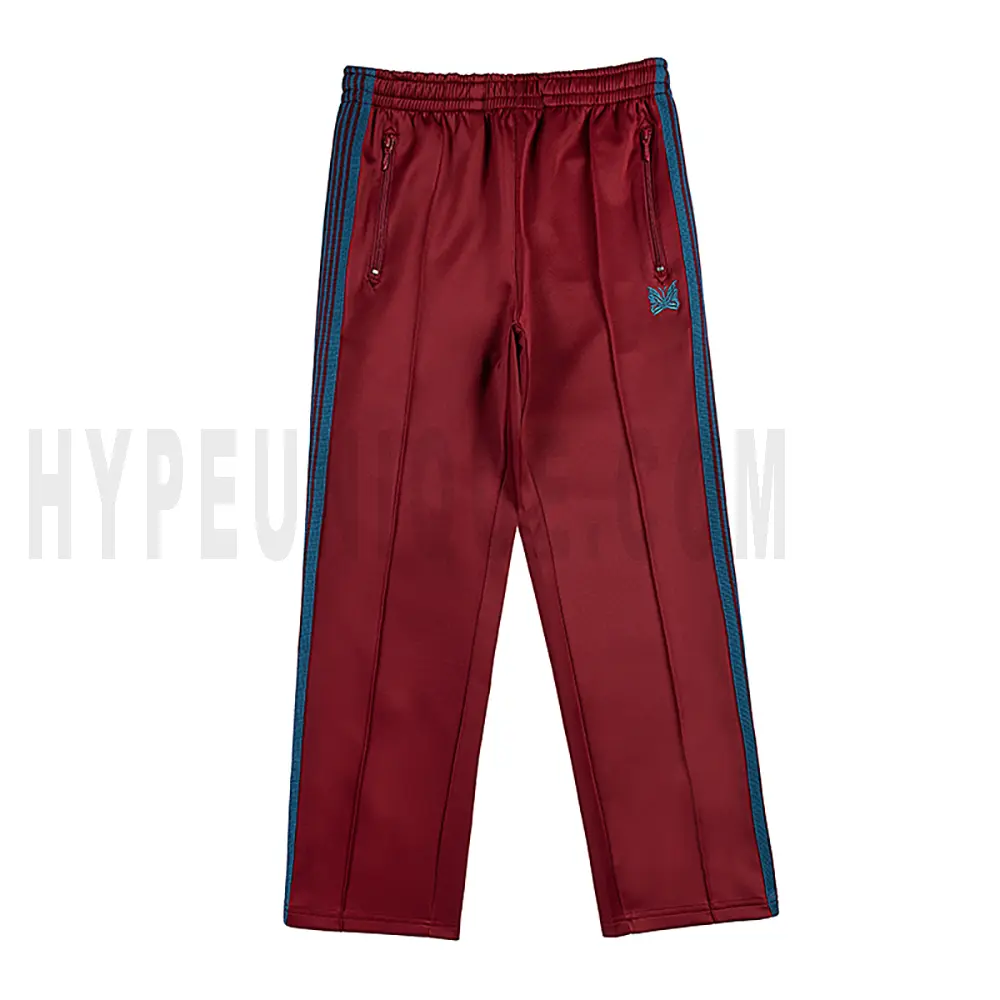 The front of the dark red pants