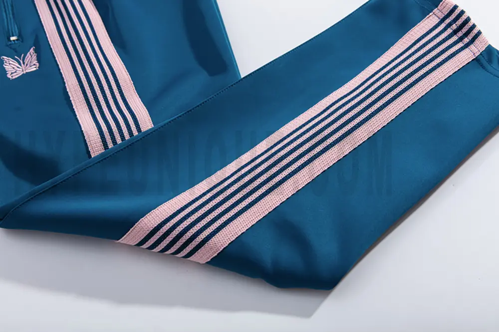 Side stripe detailing on dark blue pants