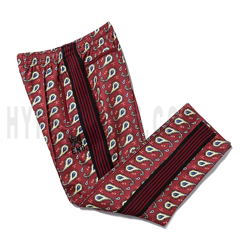 Side view of red track pants