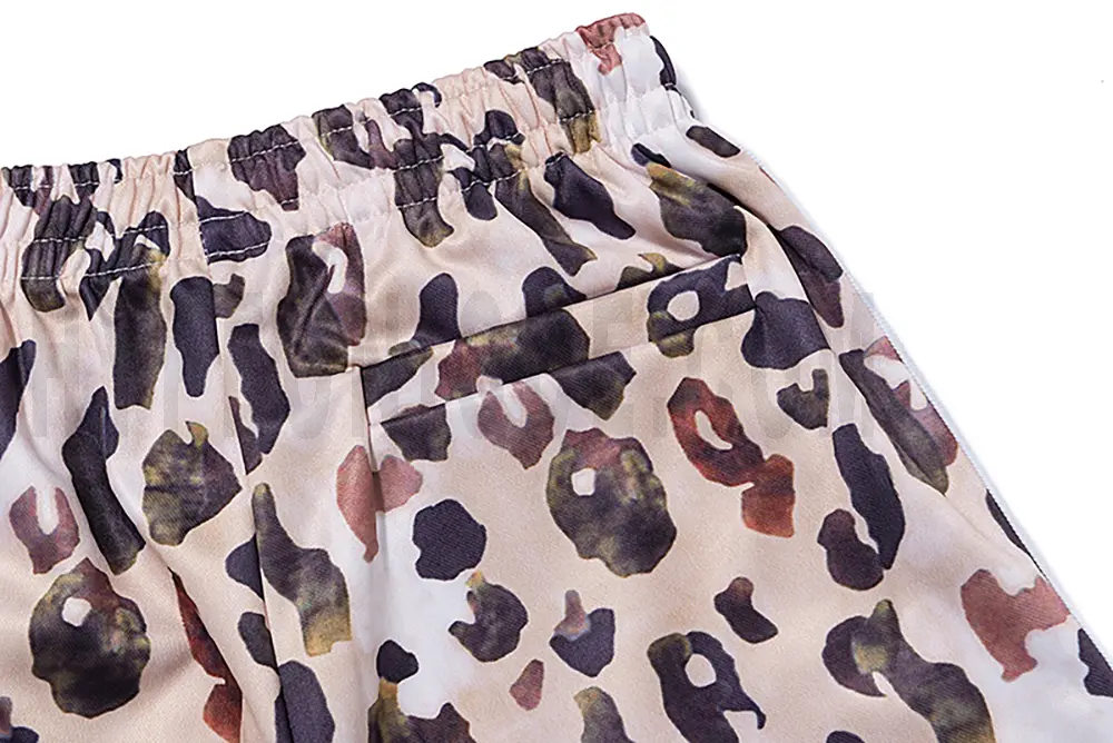 Detail of the back pocket on the track pants.
