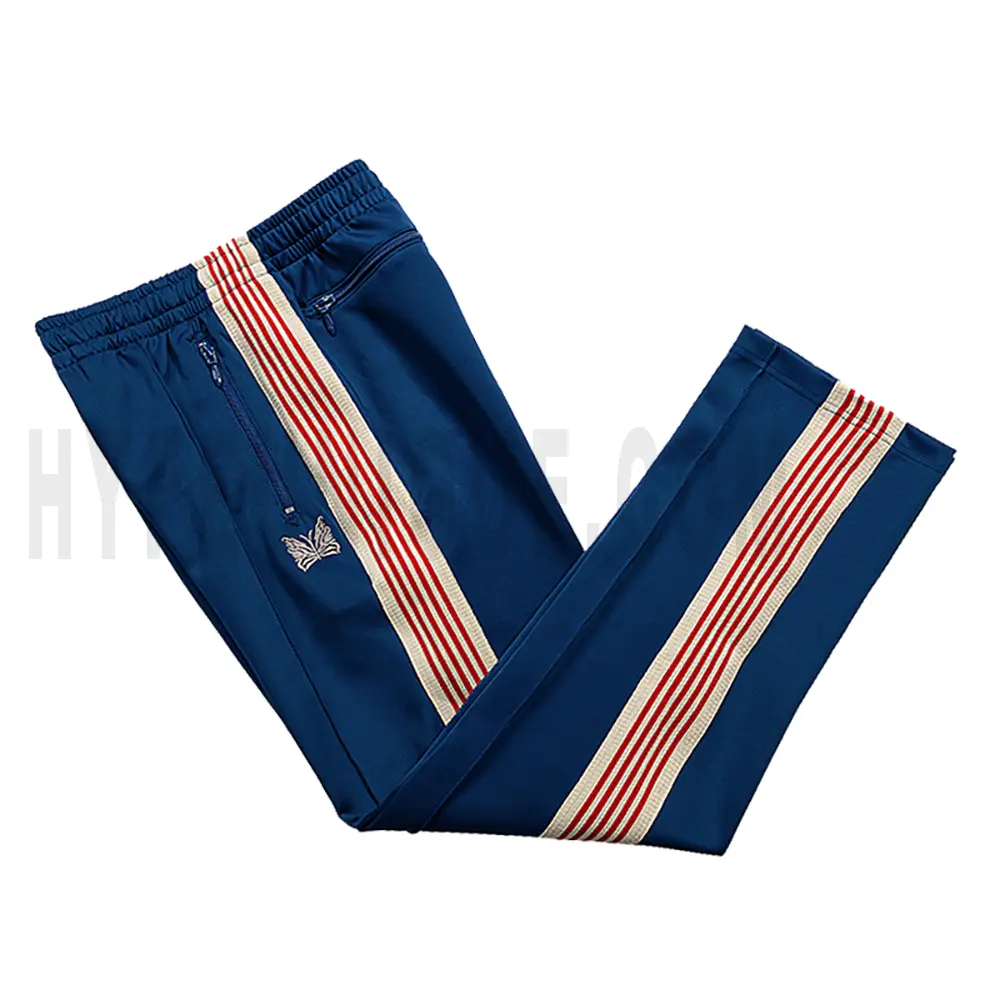 Side view of blue track pants