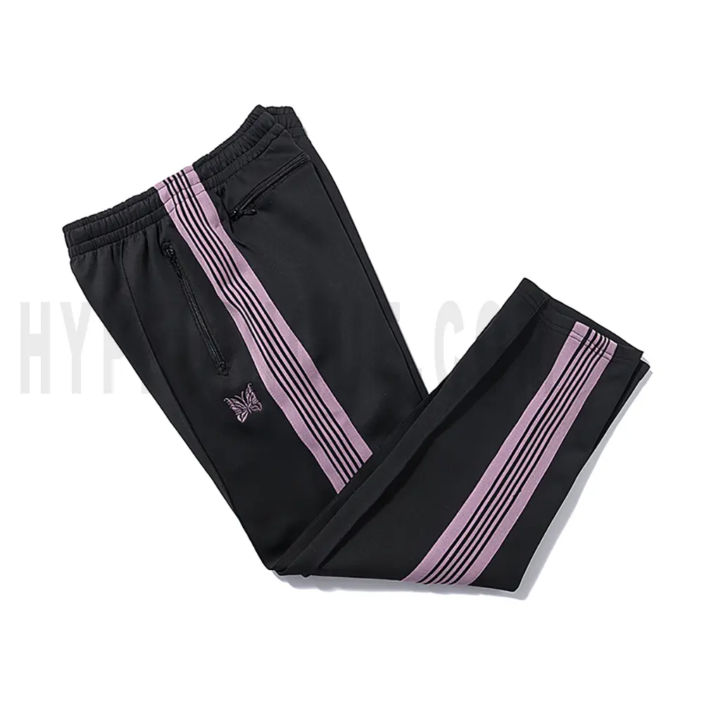 Side view of black track pants