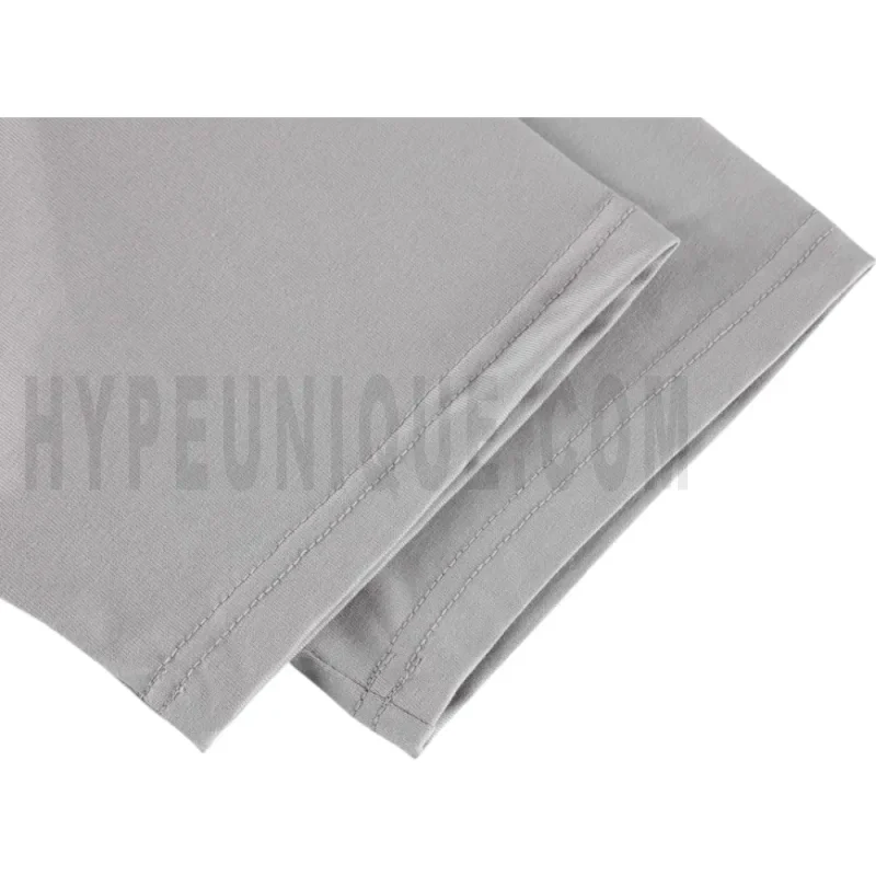 The sleeves of the gray clothes