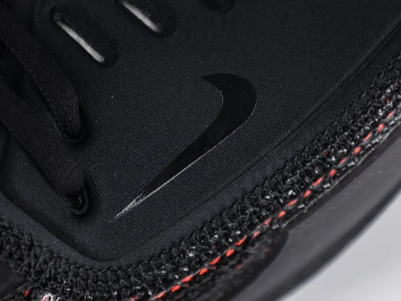 the black swoosh