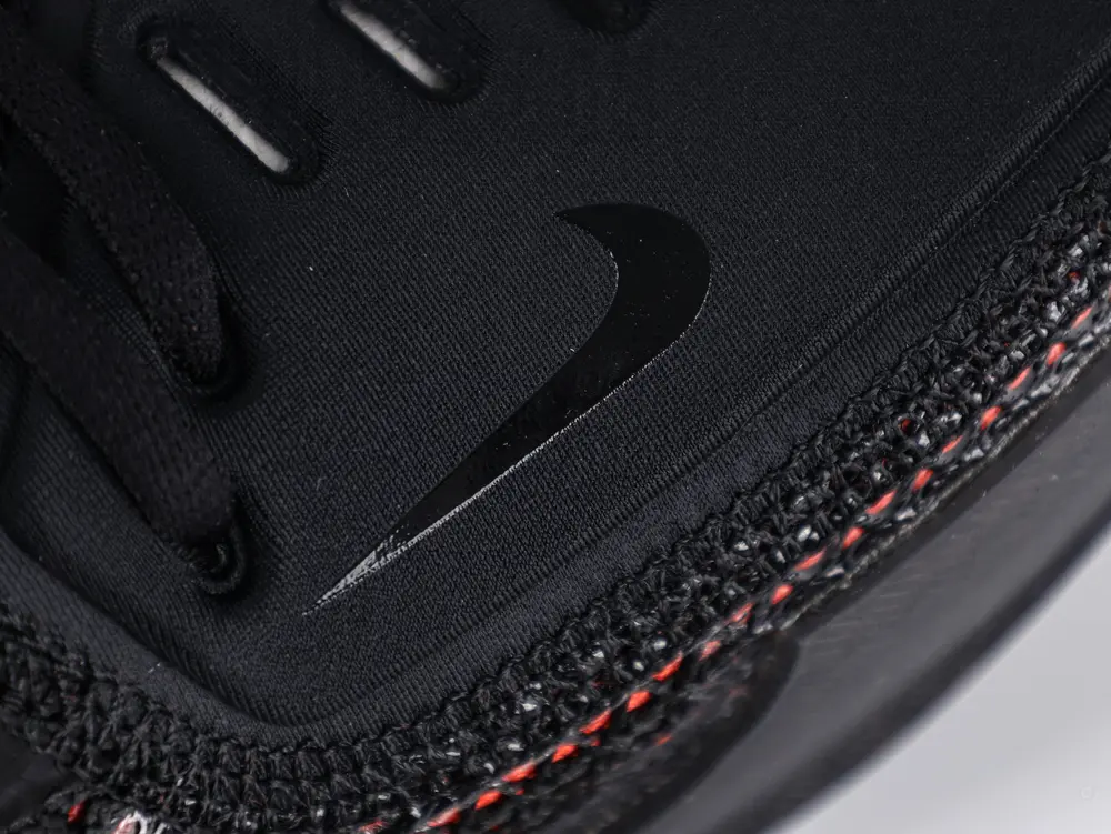 the black swoosh