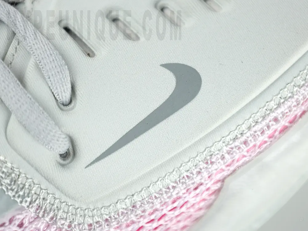the grey swoosh