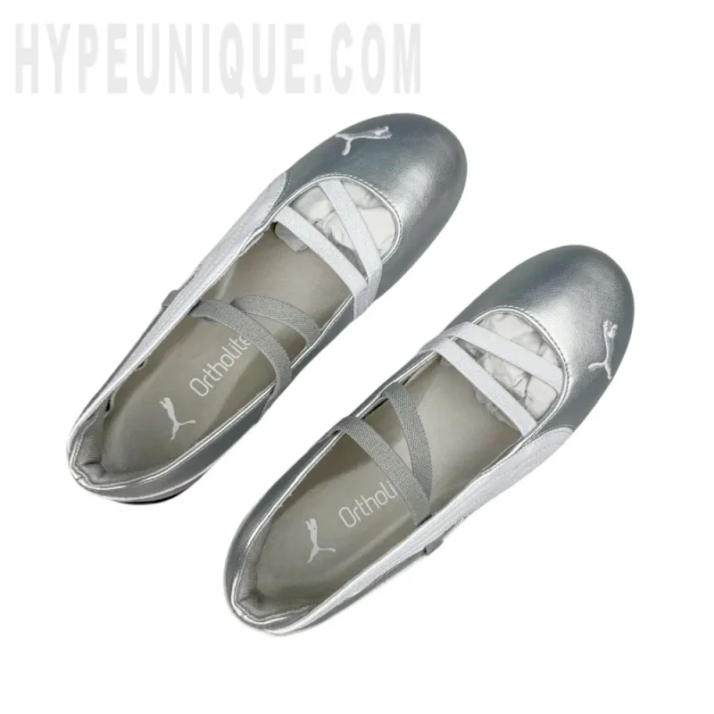 A pair of the silver shoes