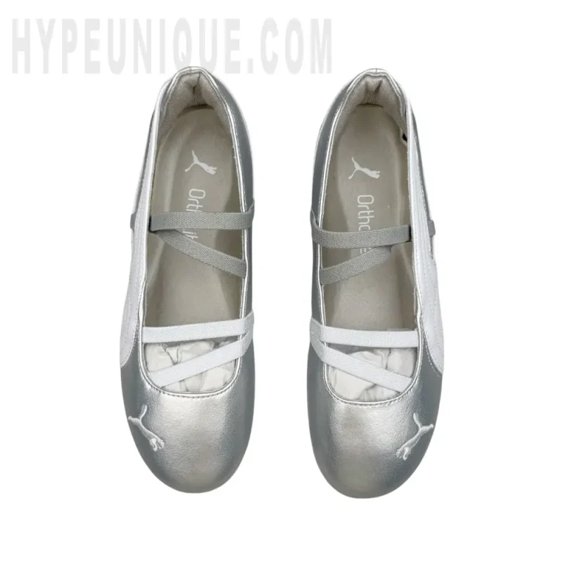 A pair of the silver shoes
