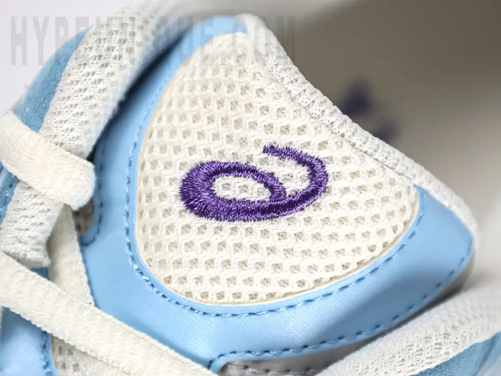 the purple logo on the tonbgue