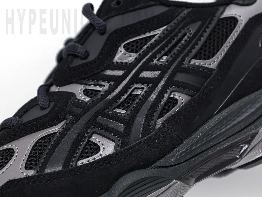 Black and grey athletic running shoes
