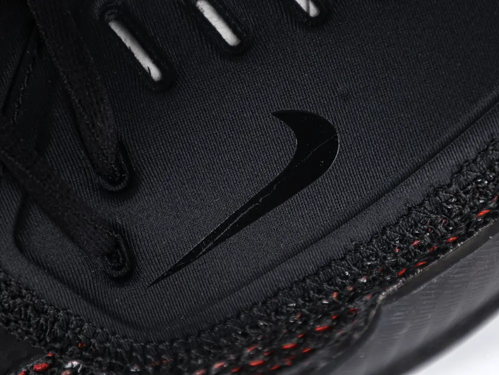 the black swoosh