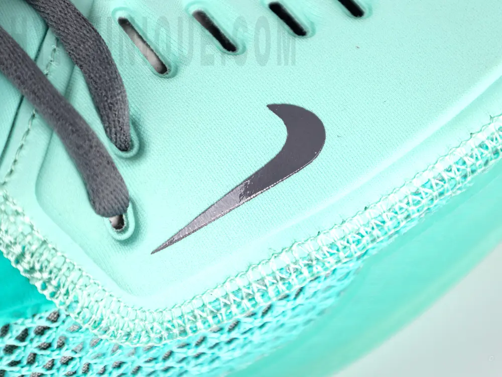 the black swoosh