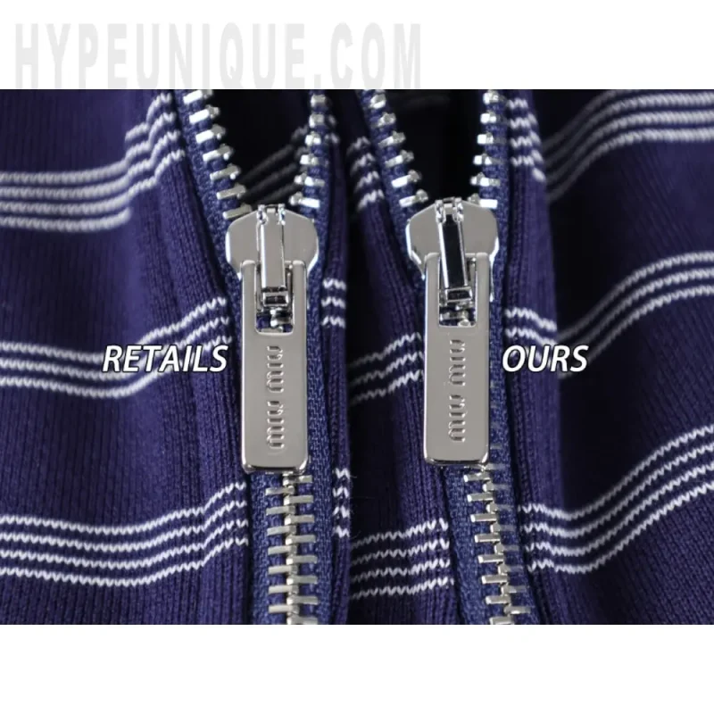 a zipper on a blue and white striped fabric