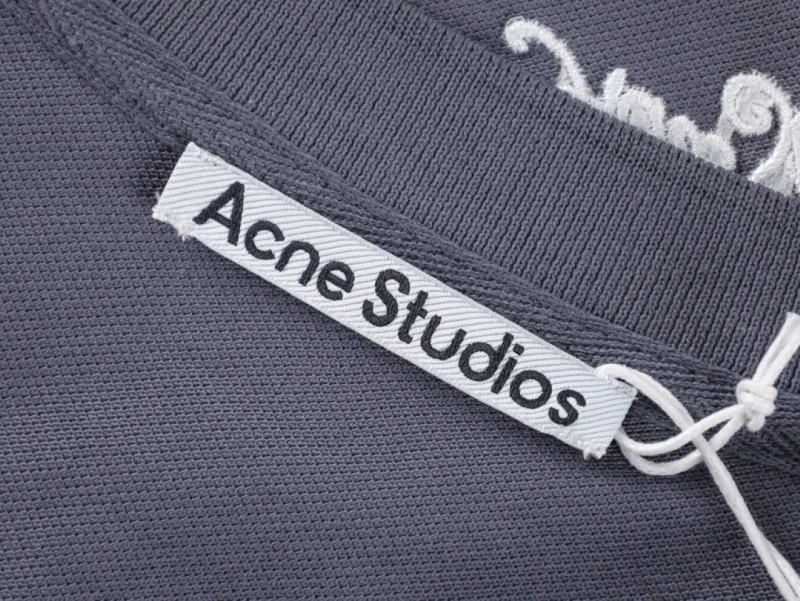 the acne studios neck tag