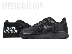 Front view of the Kobe Bryant x Nike Air Force 1 Low and hypeunique logo. Showing the black snakeskin upper.