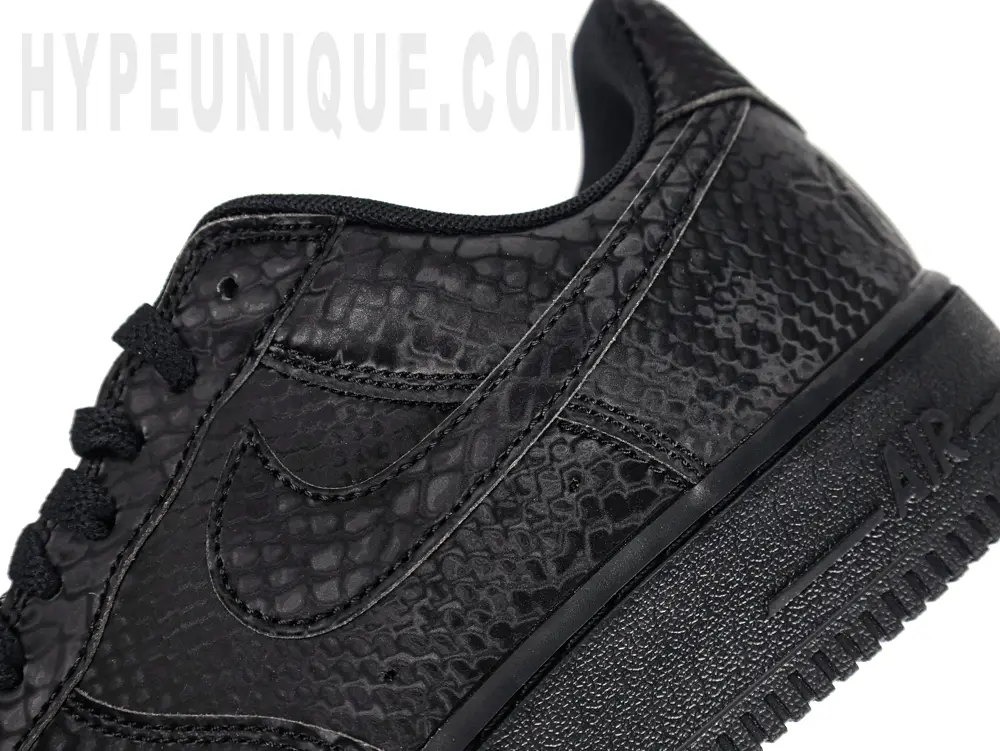 Kobe Bryant x Nike Air Force 1 Low heel swoosh close-up. Black snake scale leather material