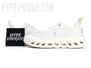 On Cloudtilt Loewe 2 ‘All White’ photographed alongside the Hypeunique logo