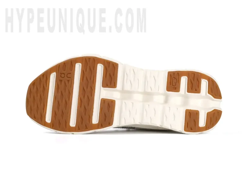 Front view of the white and brown outsole on the On Cloudtilt Loewe 2 ‘All White’