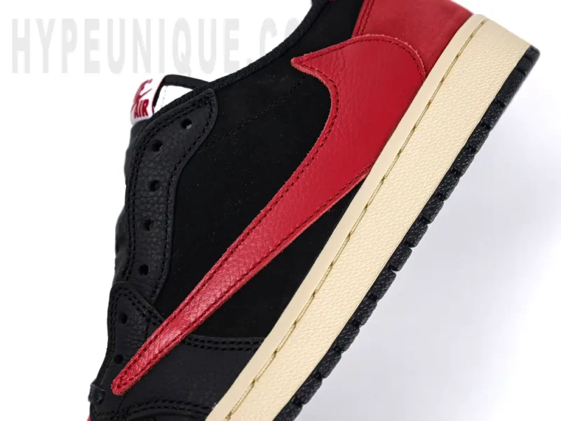 Red leather logo on the outside of the shoe