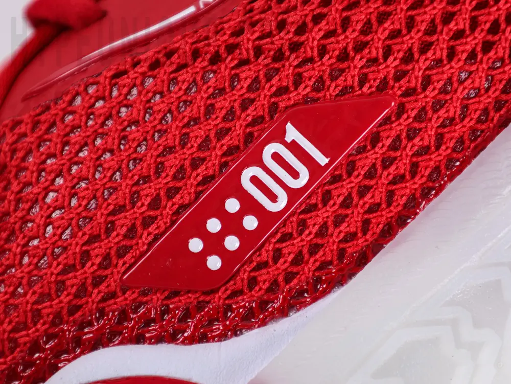 White “001” branding logo on the side of the Zoom GT Cut TB ‘University Red’.