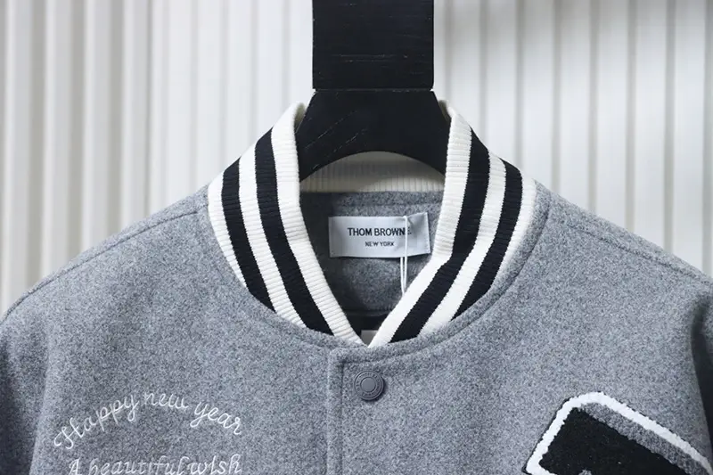 TB Multi-Element Embroidered Four-Stripe Jacket Neckline