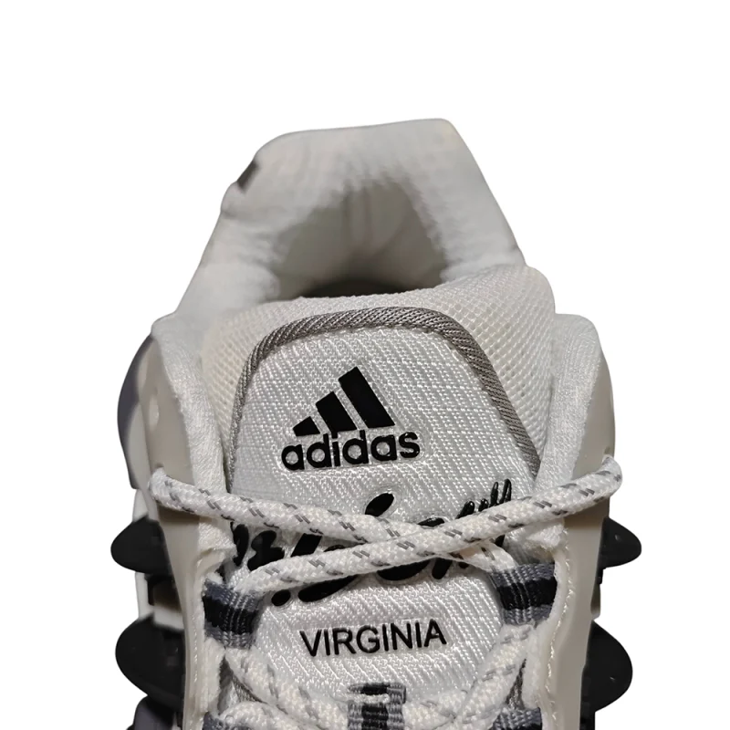 White and black Adidas running shoes