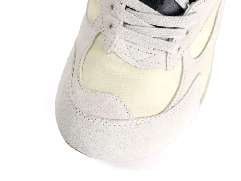 Front view of the top of the beige shoe toe