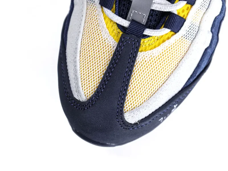 Stylish navy and yellow sneakers design