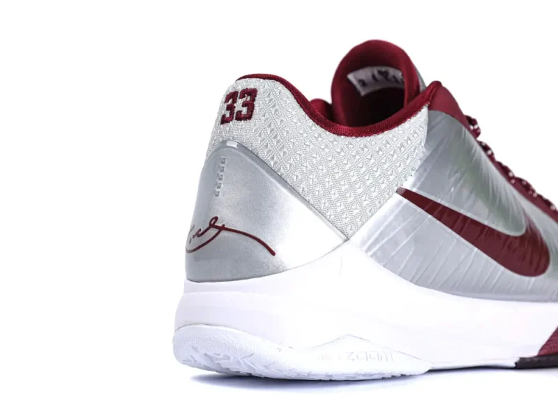 Silver and maroon basketball shoes