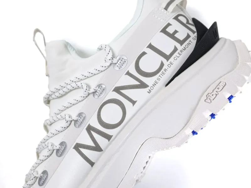 Brand logo on the outside of the left shoe
