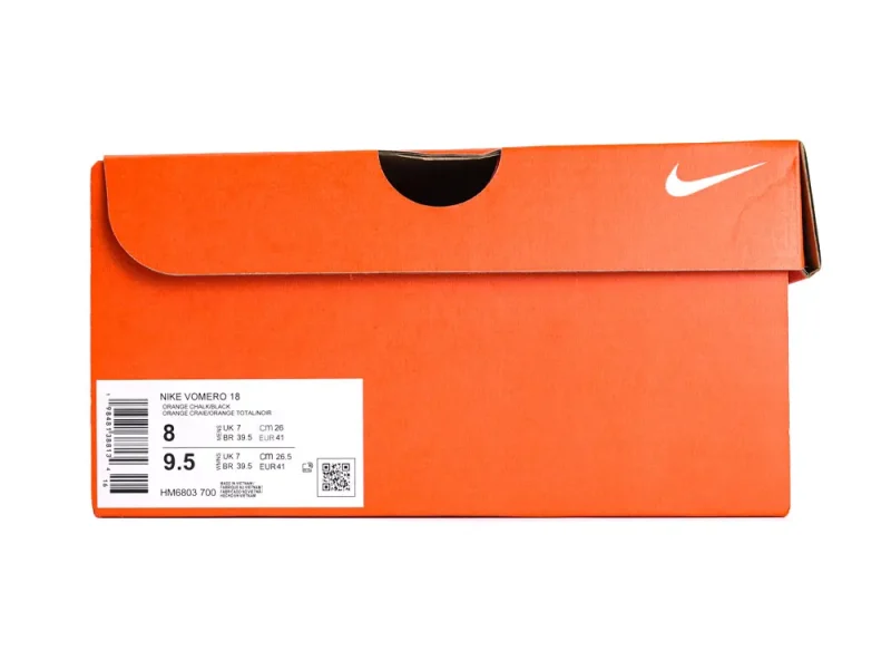 Shoe sole with vibrant orange accents