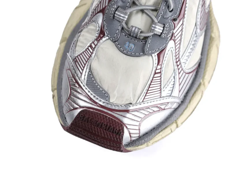 Side view of the silver shoe toe.
