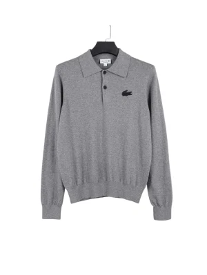 Gray long-sleeve polo shirt with black buttons, embroidered logo, made of soft fabric, hung on a black hanger.