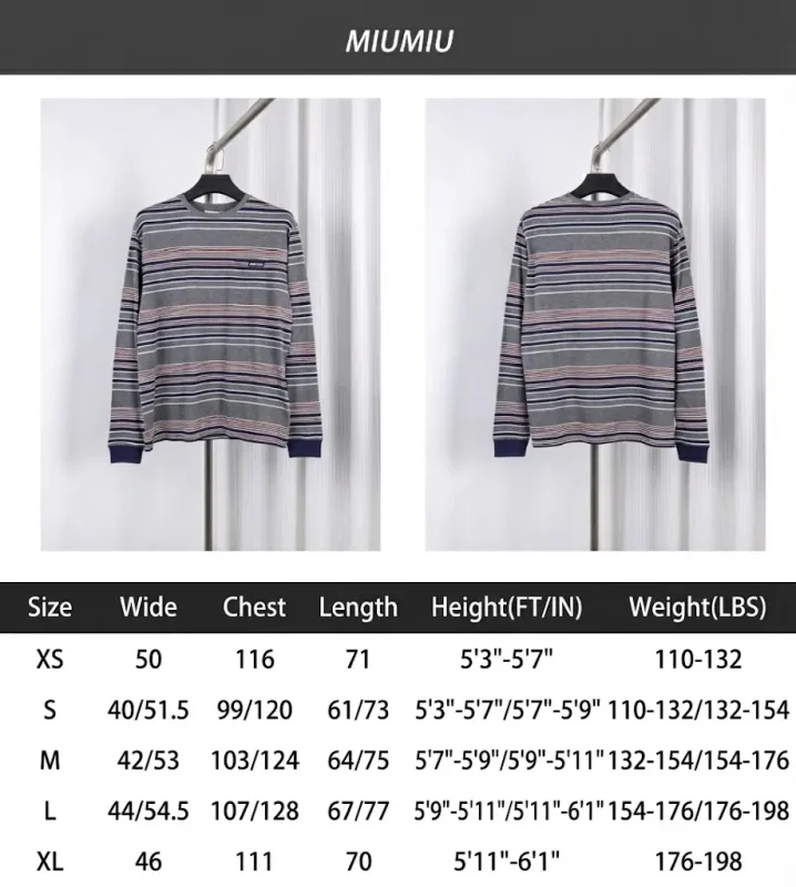 Striped long-sleeve shirt on hangers, featuring gray, pink, and navy colors; navy cuffs contrast with horizontal stripes.