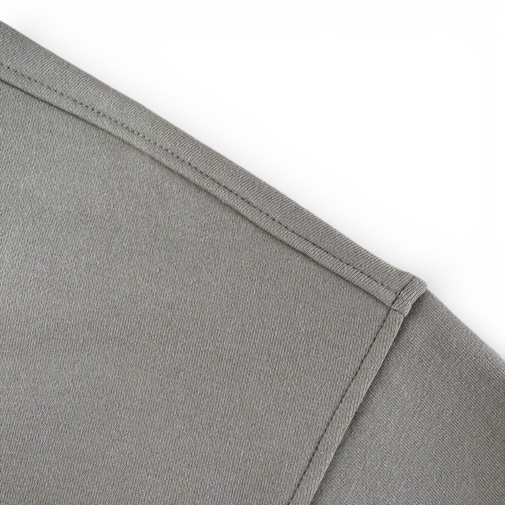 Close-up view of the shoulder area of the clothing.