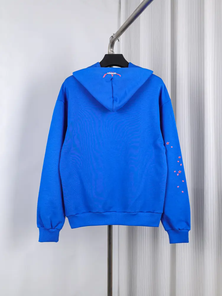 Blue cotton hoodie with star designs on the sleeve and back view.