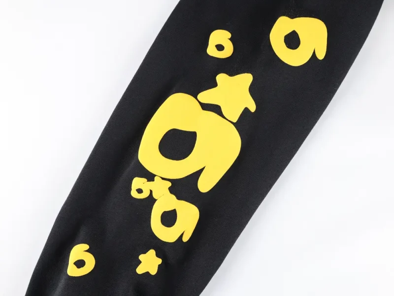 Yellow screen print logo on the long-sleeved shirt.