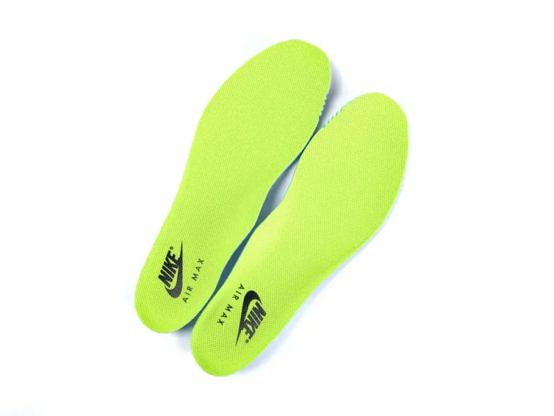 Bright green, fabric shoe insoles featuring the Nike Air Max logo design.