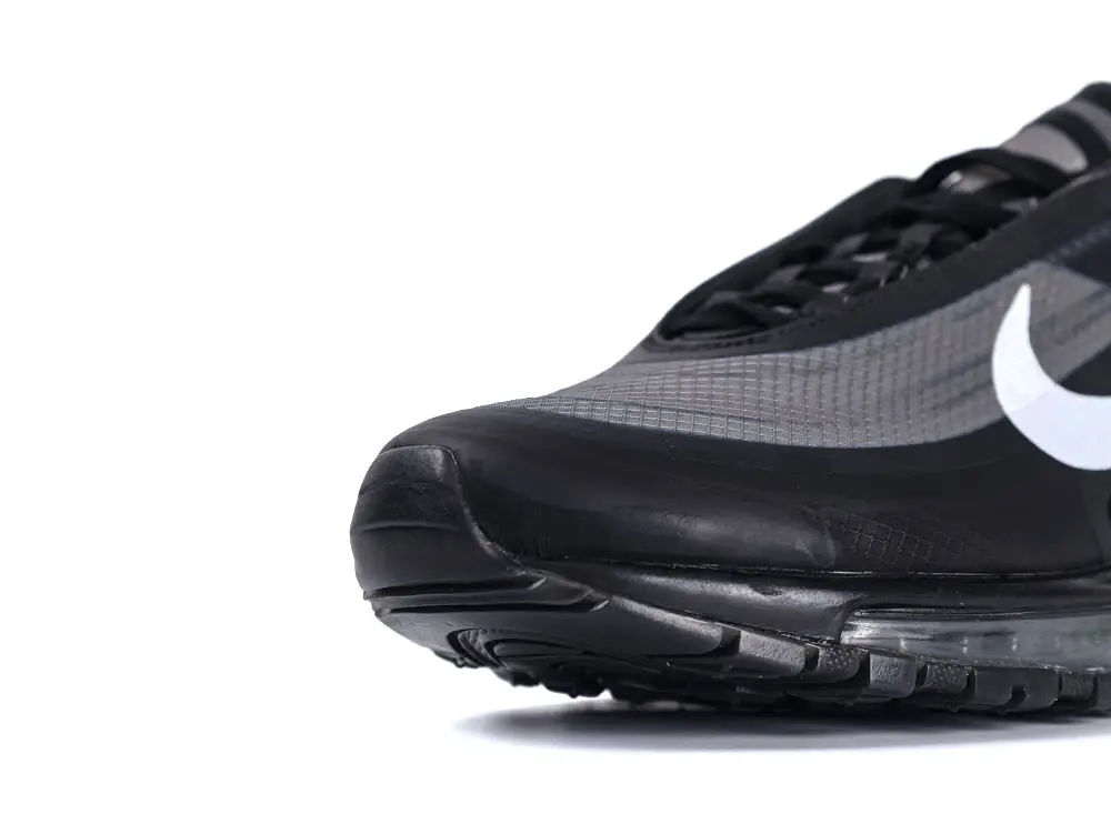 Black and gray sneaker with mesh material and visible air cushion insole.