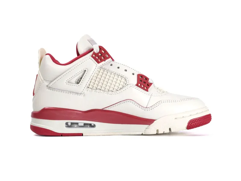 White and red leather sneaker with mesh side panel and visible air sole unit.