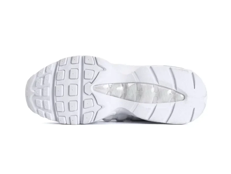 White rubber sneaker sole with textured grip pattern and transparent insert.